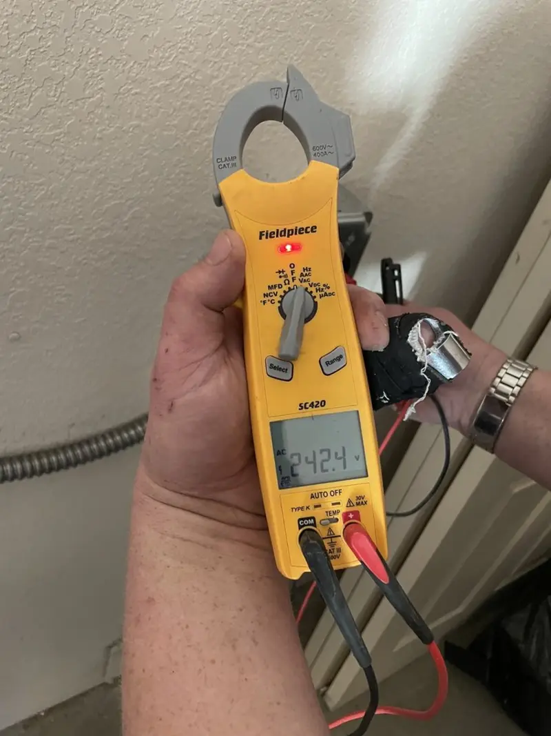 Voltage testing with clamp meter during Hot Tub / Pool Electrical Wiring in Portland